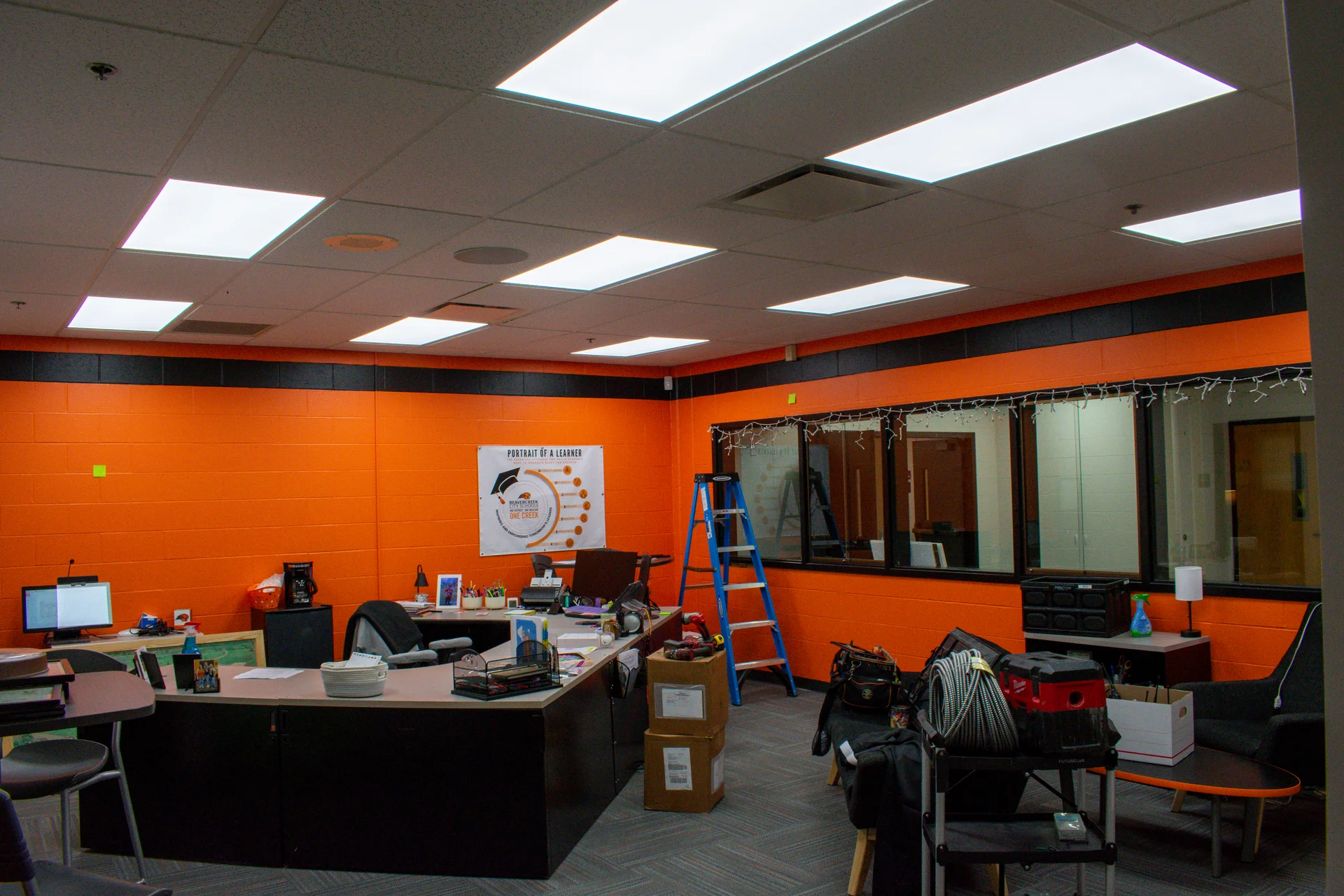Realigned drop ceiling and new dimmable LED flat panels over the Beavercreek High School main office during move-in